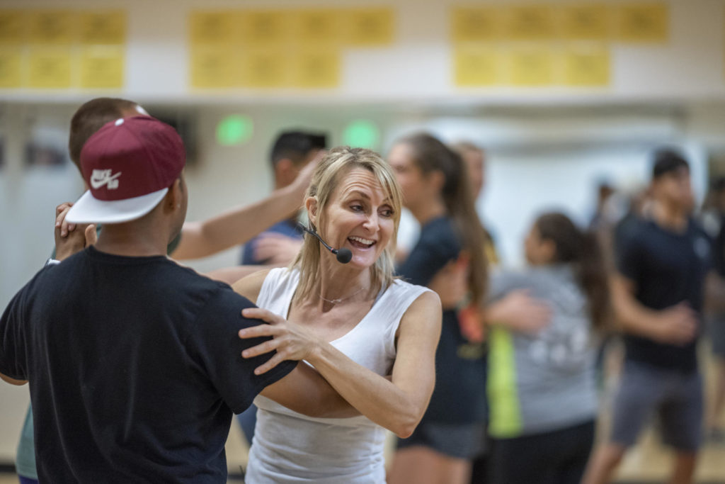 Cathrine Himberg directs her class while in a dance hold with a student
