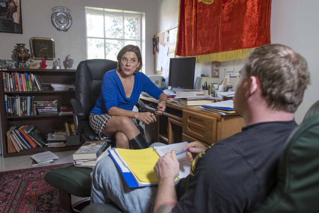 Professor Kate Transchel (left) advises student Justin Nielsen (right) in her office on Tuesday, March 3, 2015 in Chico, Calif. Professor Kate Transchel has been selected for the Outstanding Adviser Award. Since joining the Department of History in 1996, she has served as a club adviser, academic adviser and career mentor to students in myriad capacities. (Jason Halley/University Photographer)