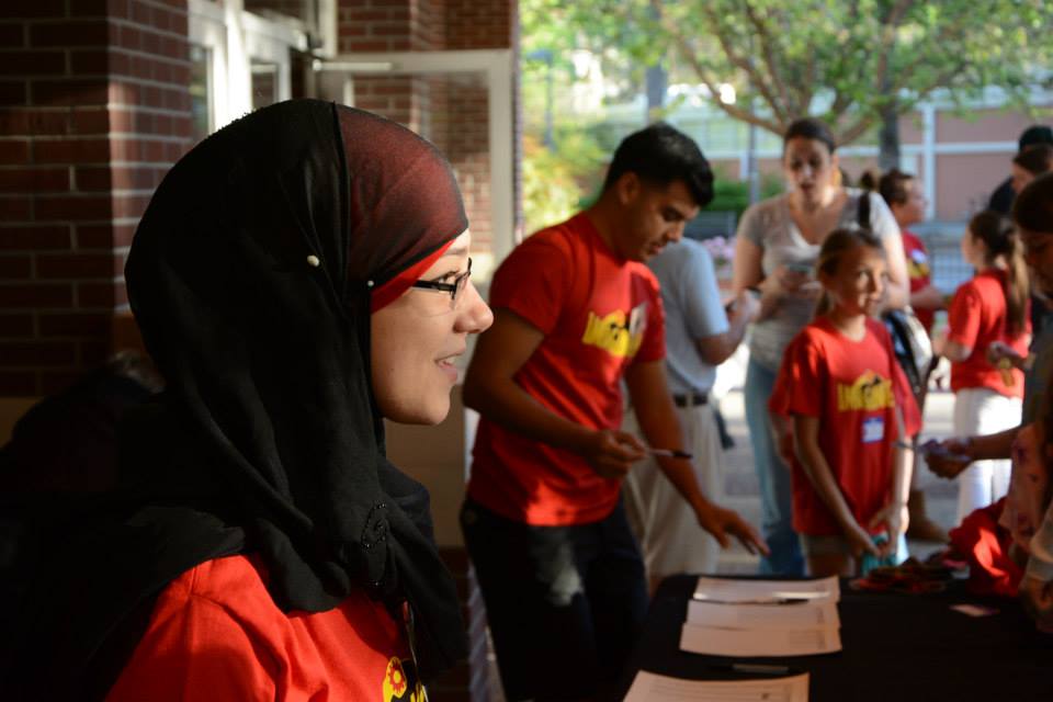 Salam Ali is shown working SWE's Imagineer Day a year ago. They always tie in a Disney or Pixar theme to engage the kids. This year it was "The Incredibles." (Picture courtesy of the Society of Women Engineers)