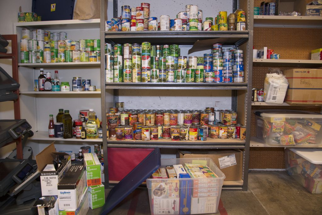 Cans fill the shelves in the Hungry Wildcat Food Pantry. This pantry is part of the Chico State Food Security Project, which provides food and nutritional services to Chico State students who are experiencing food insecurity. One of the food storage locations, located in the Bell Memorial Union, is photographed on Thursday, July 7, 2016 (Jessica Bartlett/Student Photographer)