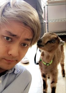 Jeff Barron and a baby goat.