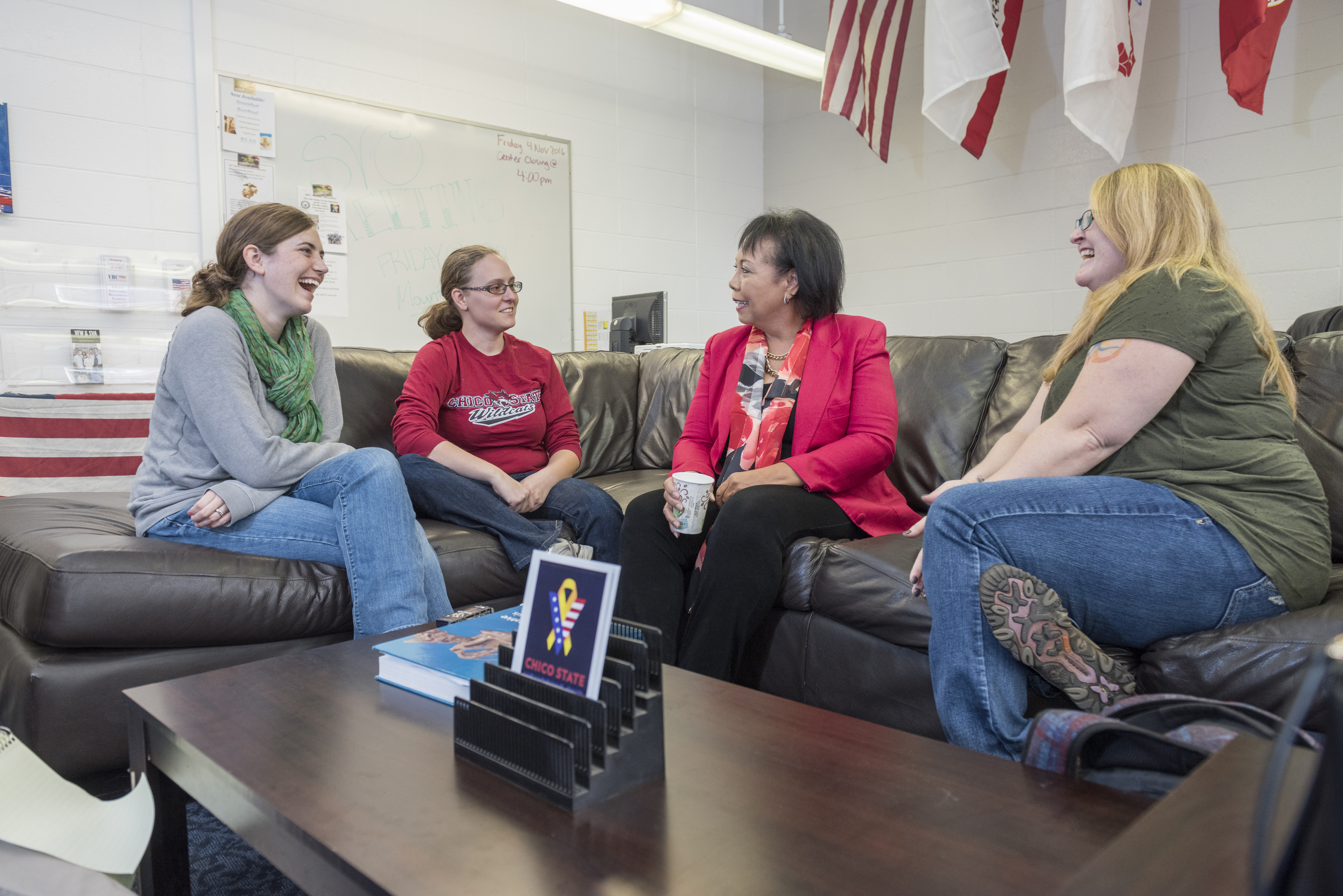 Mary Kight (second from right) talks to CSU, Chico veteran students Kaitlin Gronlund, Trista Beitz, and Rachele Rooney (left to right).
