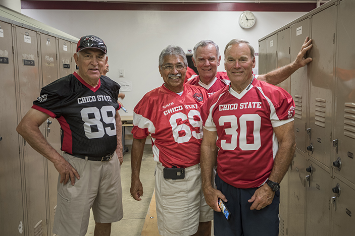 Wildcat football alumni pose in Chico State jerseys