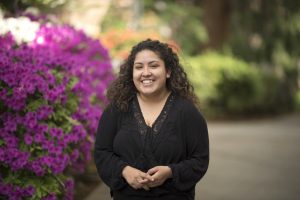 Outstanding Senior Unique Torres is photographed in Old Hutch Plaza on Tuesday, April 10, 2018 in Chico, Calif. Unique is a Journalism major and Spanish minor hoping to find a career in social justice. (Jessica Bartlett /University Photographer/CSU Chico)