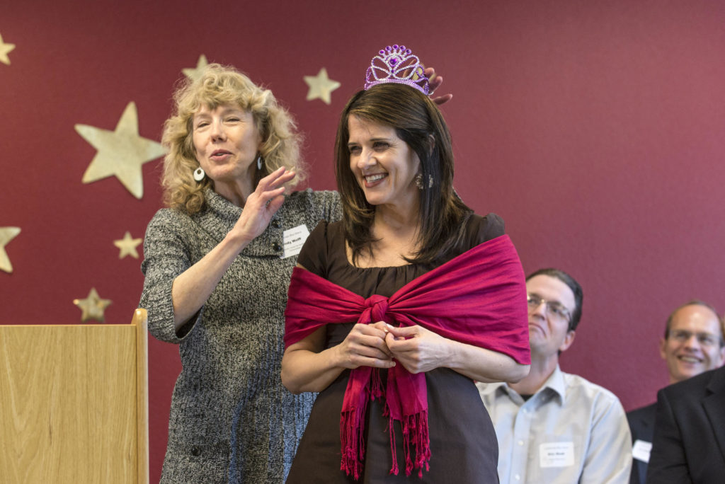 Cindy Wolff (left) honors Stephanie Bianco (right) at a February 2015 reception for the 2014-2015 Professional Achievement Honors, which highlight faculty who have exemplified the teacher-scholar model over the past three years.