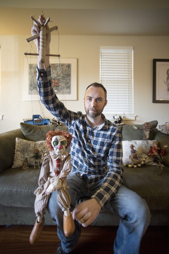 Josh Funk displays one of the models used in his short film, 3 Keys, at his home in Chico.