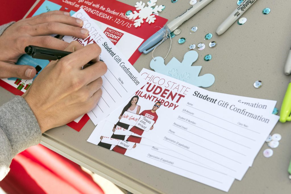 Student fills out a card.