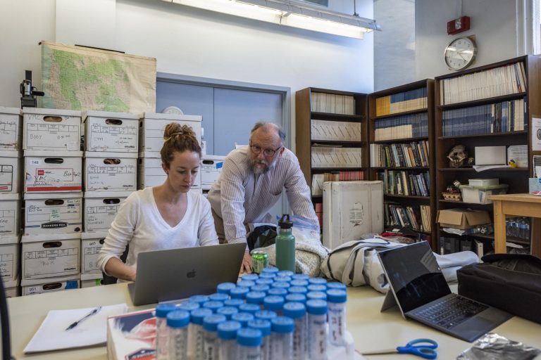 Faculty Ashley Kendell (left) and P. Willey (right) work in the Anthropology Department Human Identification Laboratory.