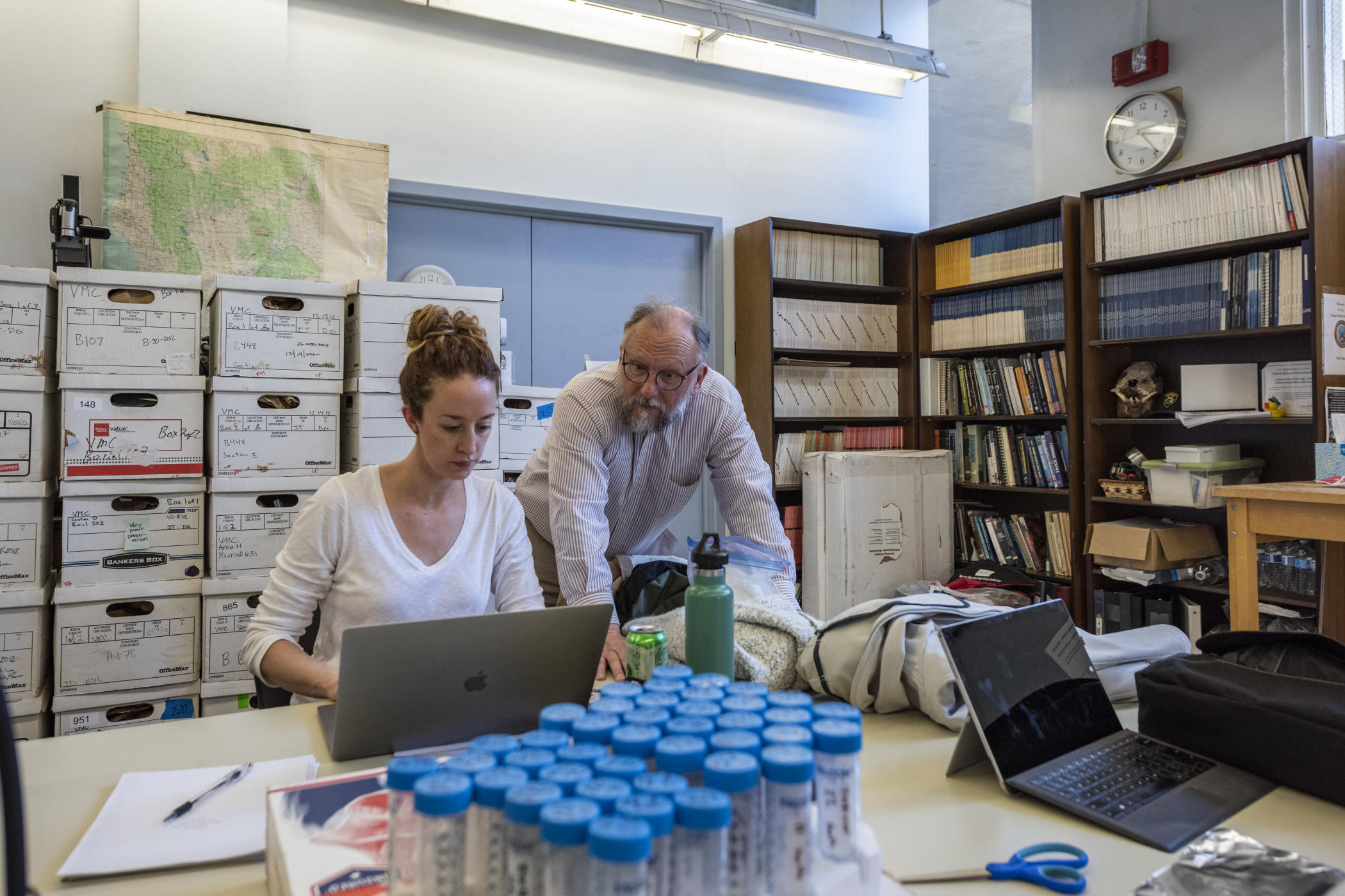 Faculty Ashley Kendell (left) and P. Willey (right) work in the Anthropology Department Human Identification Laboratory.