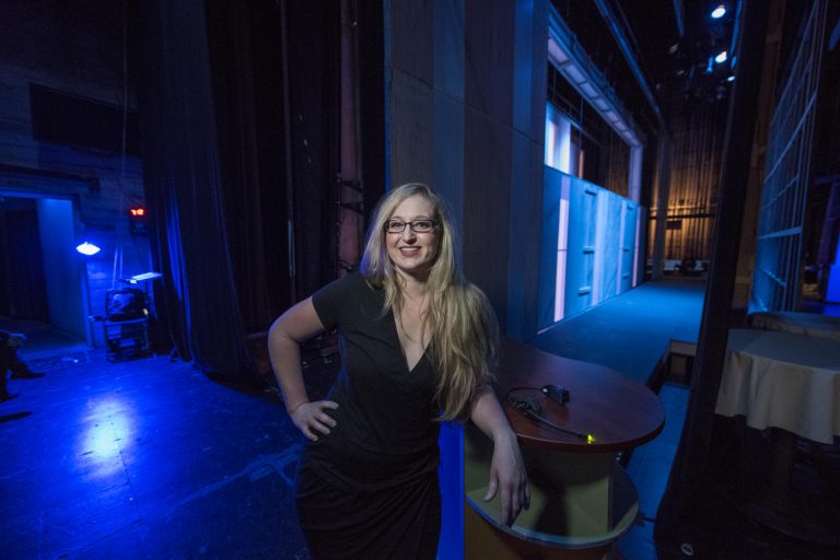 Lara Tenckhoff smiles backstage of Laxson Auditorium.
