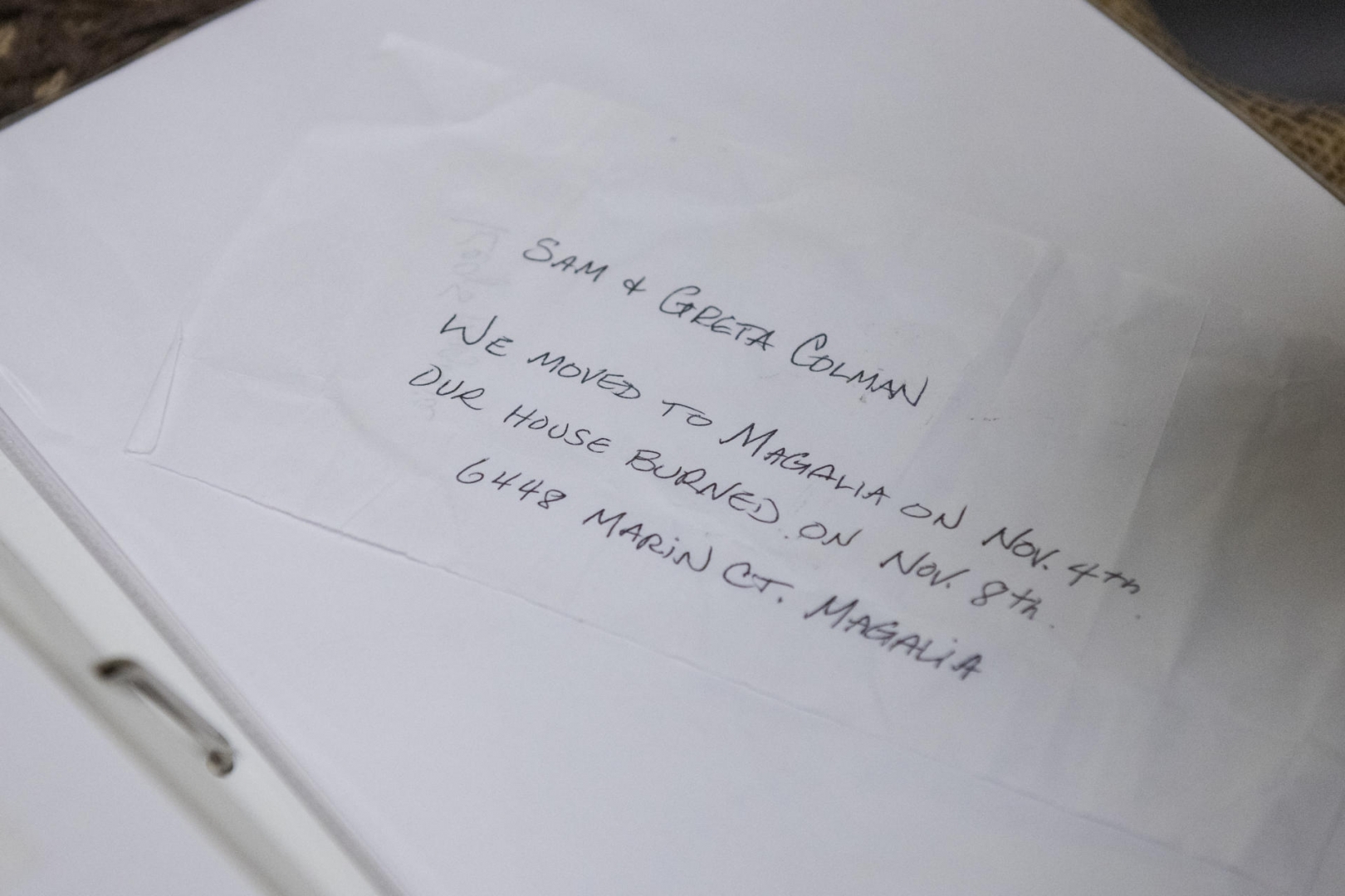 A hand-written note in a photo album says "We moved to Magalia on Nov. 4th. Our house burned on Nov. 8."