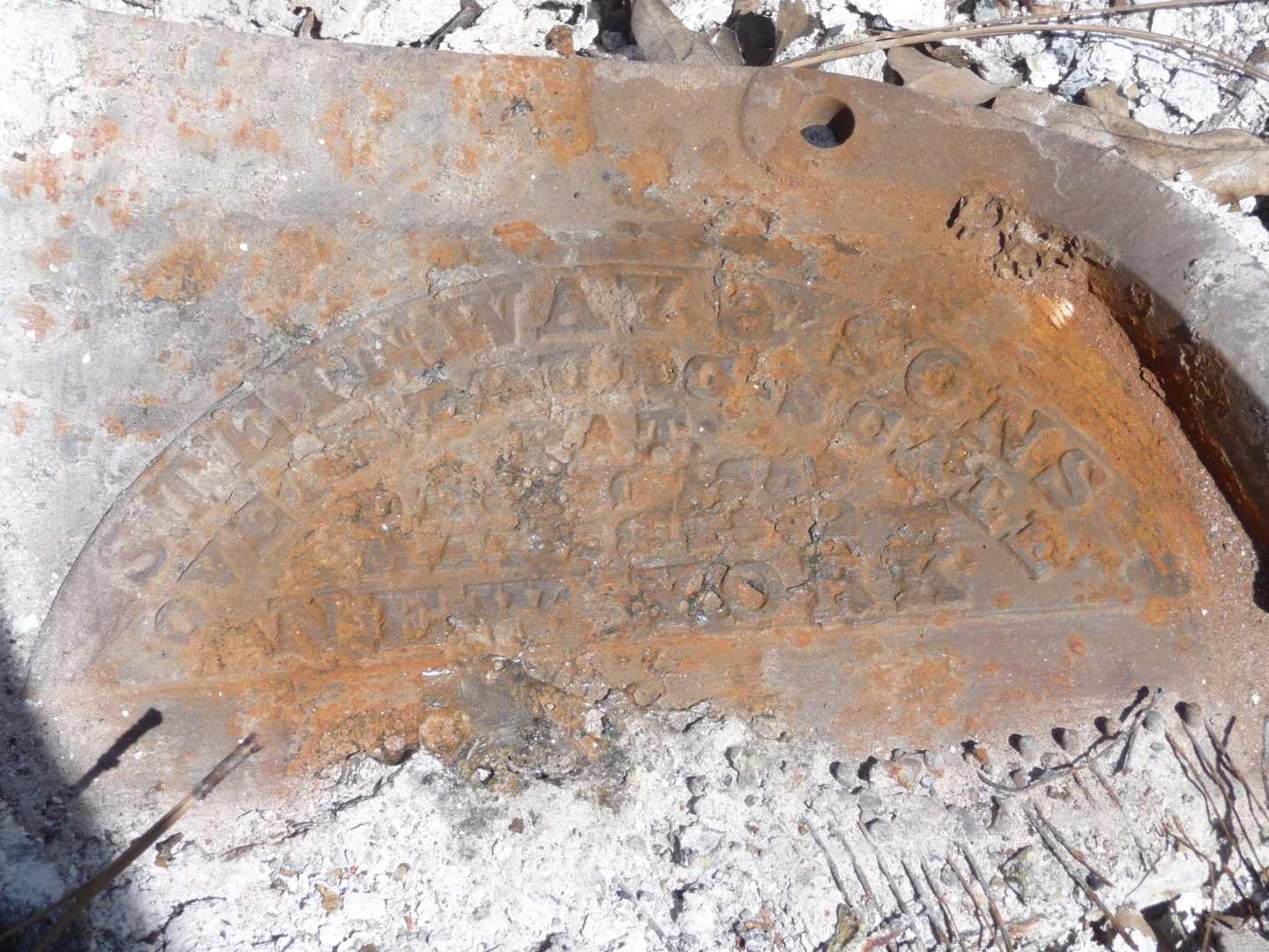 The rusted fire-scorched patent of the piano.