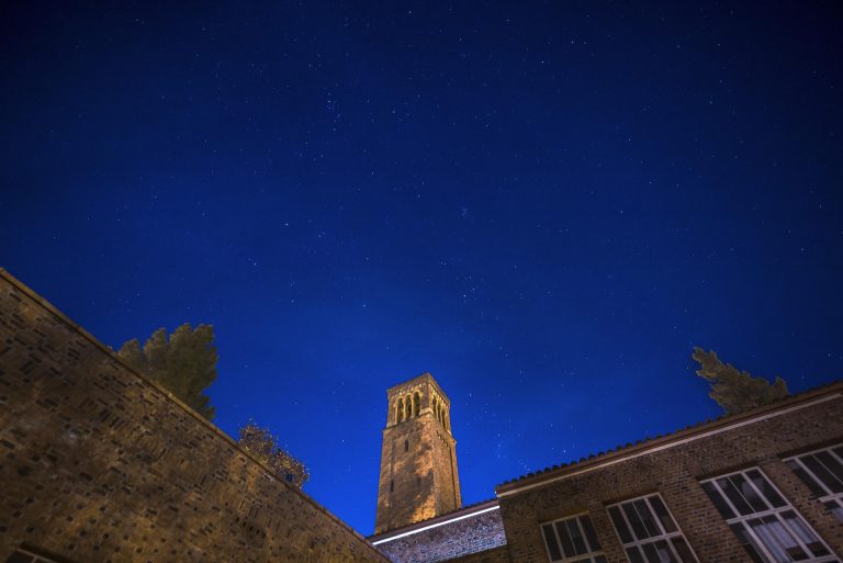 Stars shine above Trinity Hall.