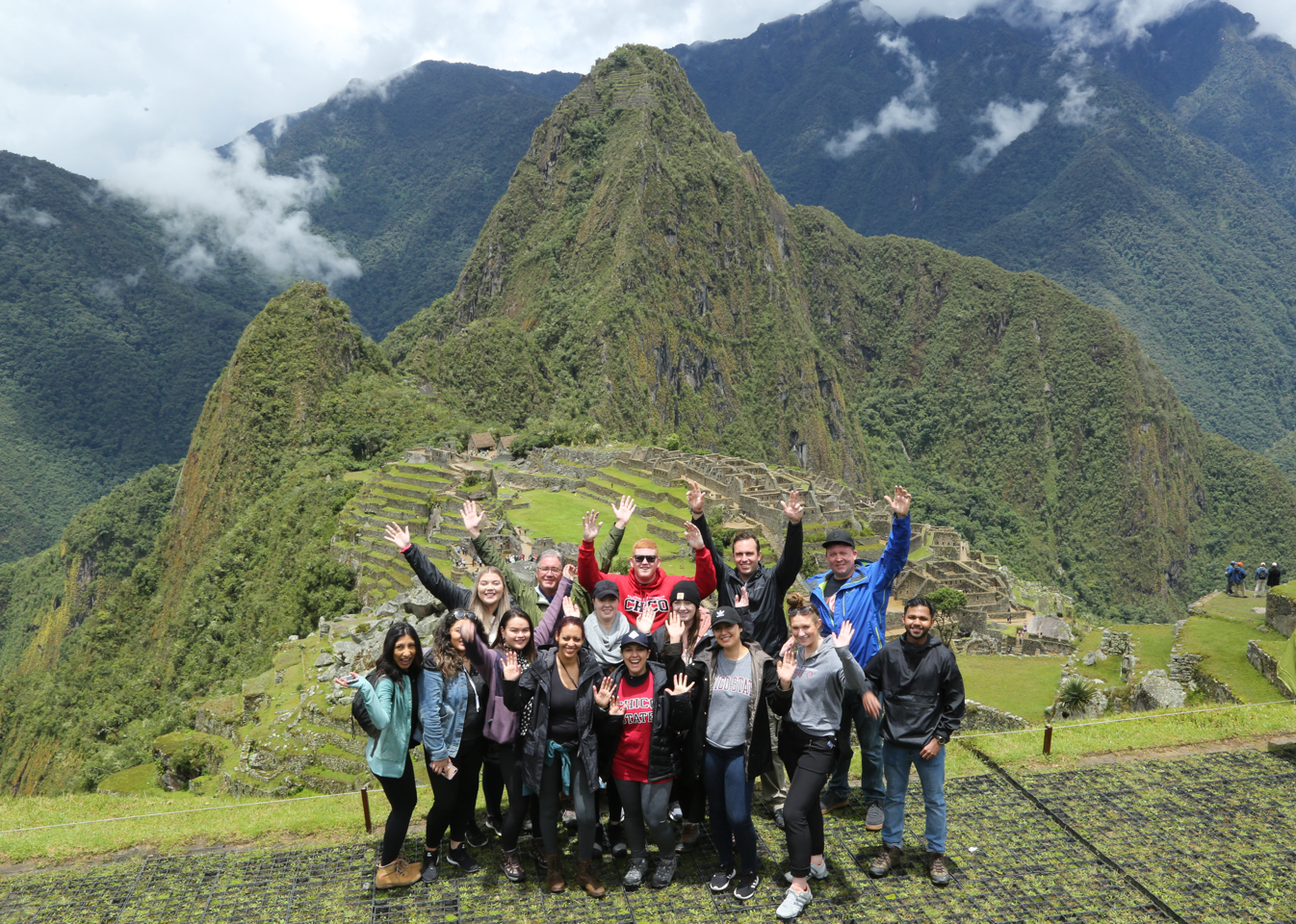 Students pose at the top of Macchu Picchu.