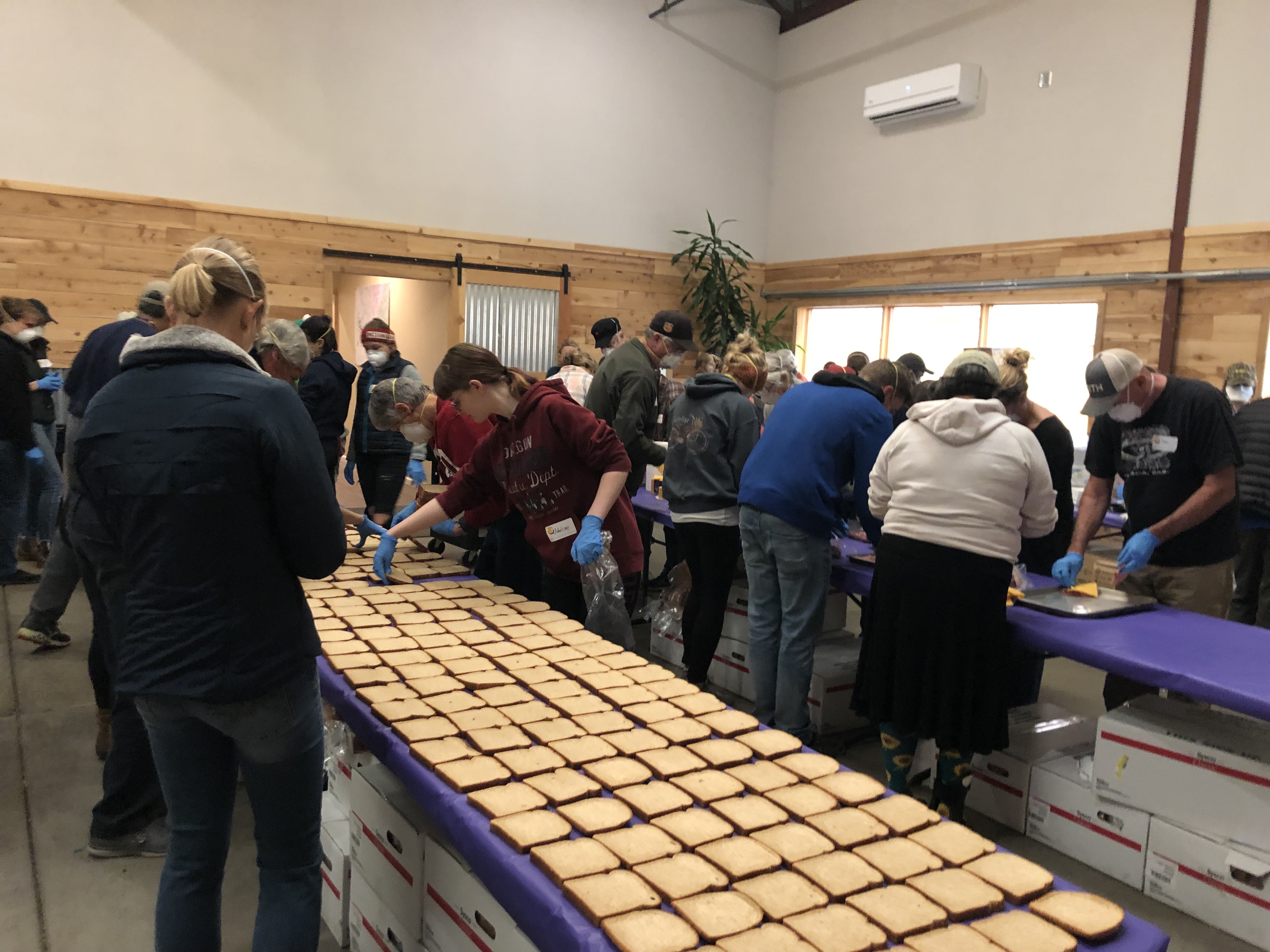Volunteers working to assemble 1,200 sandwiches for firefighters, first responders, and shelter volunteers during the Camp Fire.
