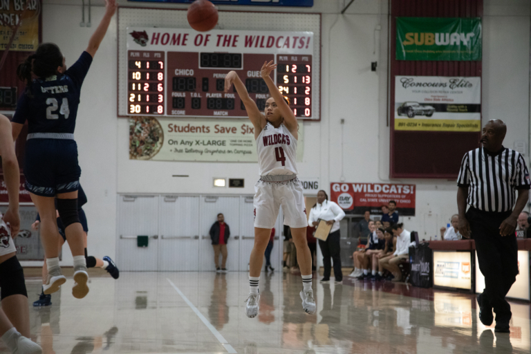 Maddy Wong shows picture-perfect follow-through as she releases a jump shot.