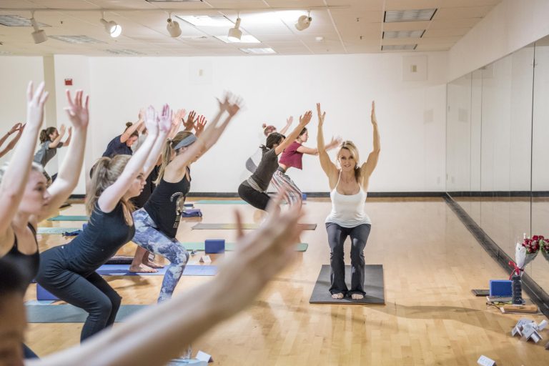 Cathrine Himberg teaches during her Intermediate Yoga (KINE169B) class.