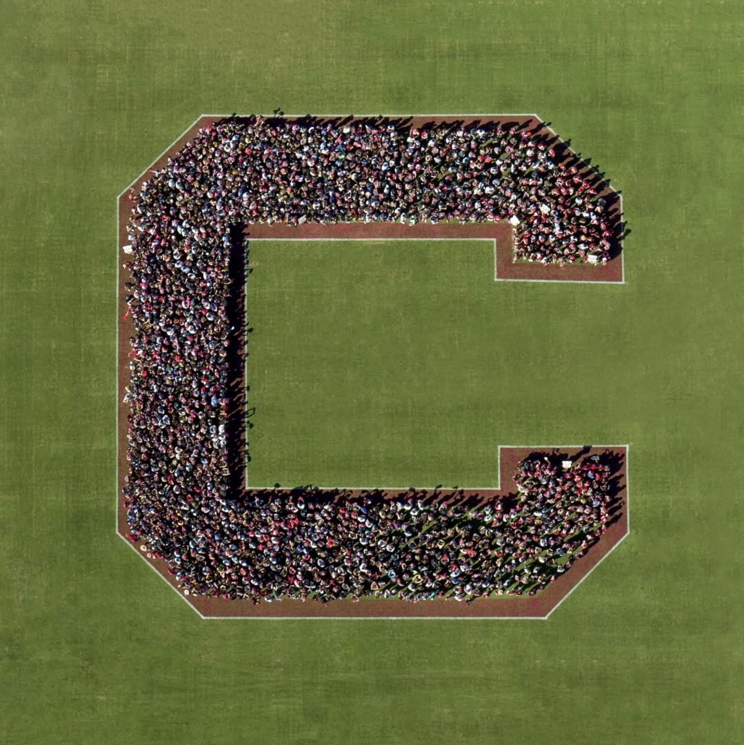 Incoming freshman and transfer students form a big "C" and are photographed from a drone