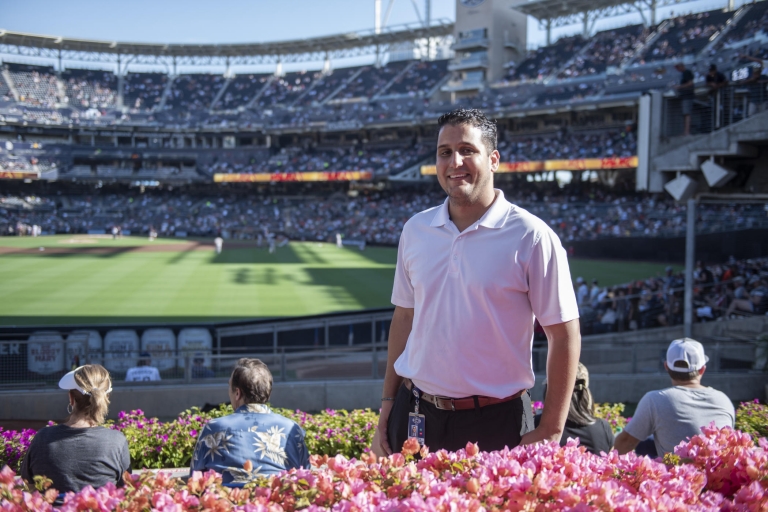 Rocky Dudum poses for a portrait in the stands of Petco Park.