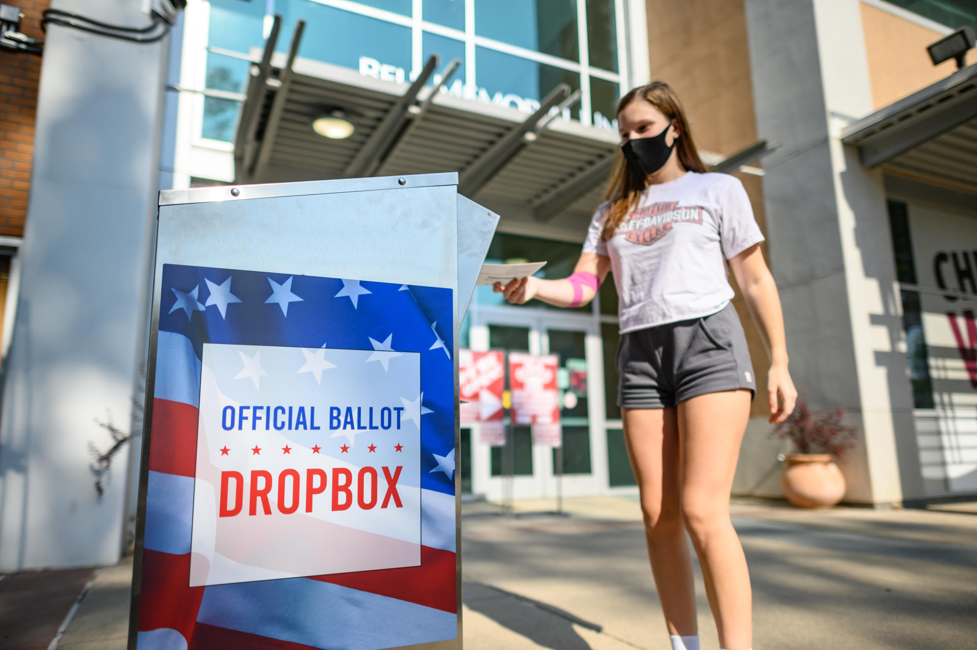 Sophia Gelsman uses an official ballot box that is placed in front the Bell Memorial Union (BMU).