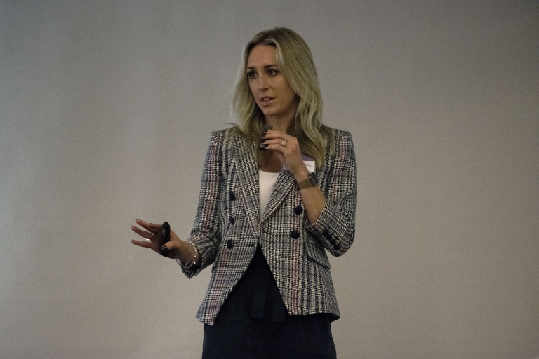 Lauren Gruwell speaks at a conference.