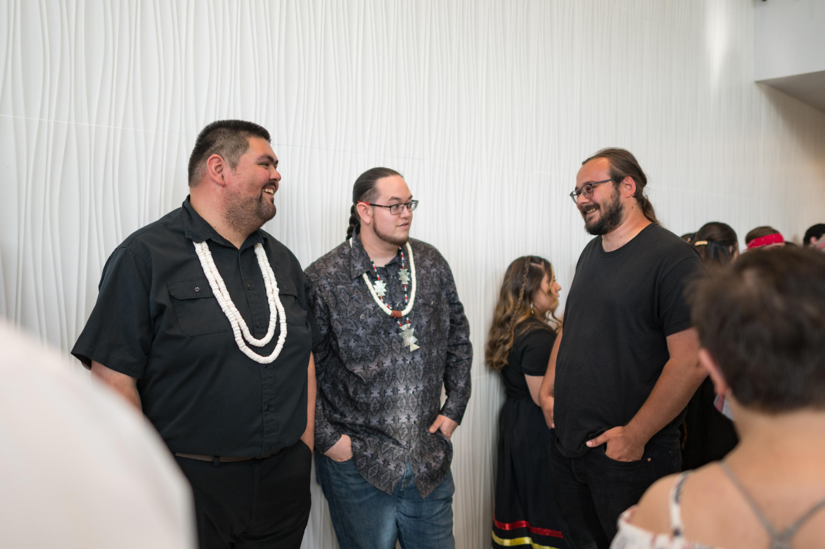 Cole Morales, Francisco Medrano and He-Lo Ramirez chat at the Tribal Relations special graduation ceremony.