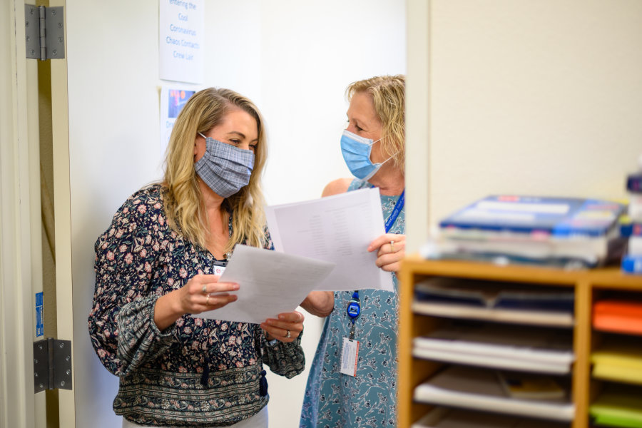 Elyse Fontana and Ann Dickman  work on COVID-19 contact tracing efforts with the Butte County Public Health office.