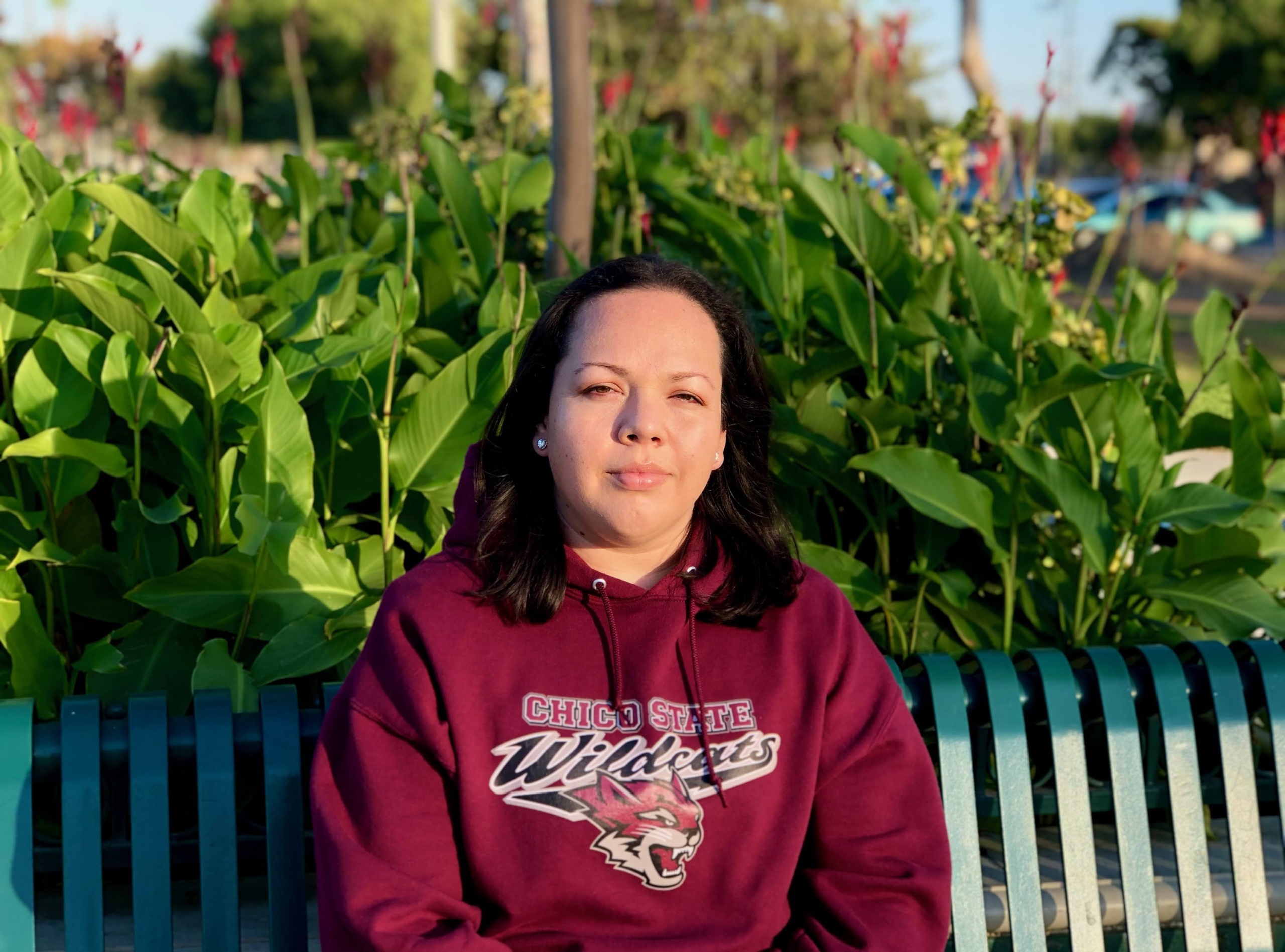Portrait of Veronica Ramirez Nievez sitting on a bench