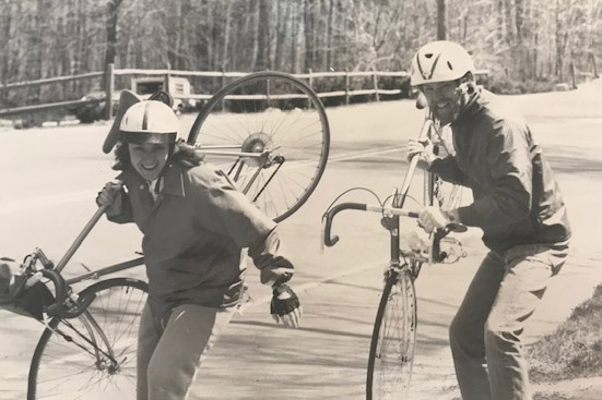 President Gayle Hutchinson and her brother pose with their bikes on a cross-country trip.