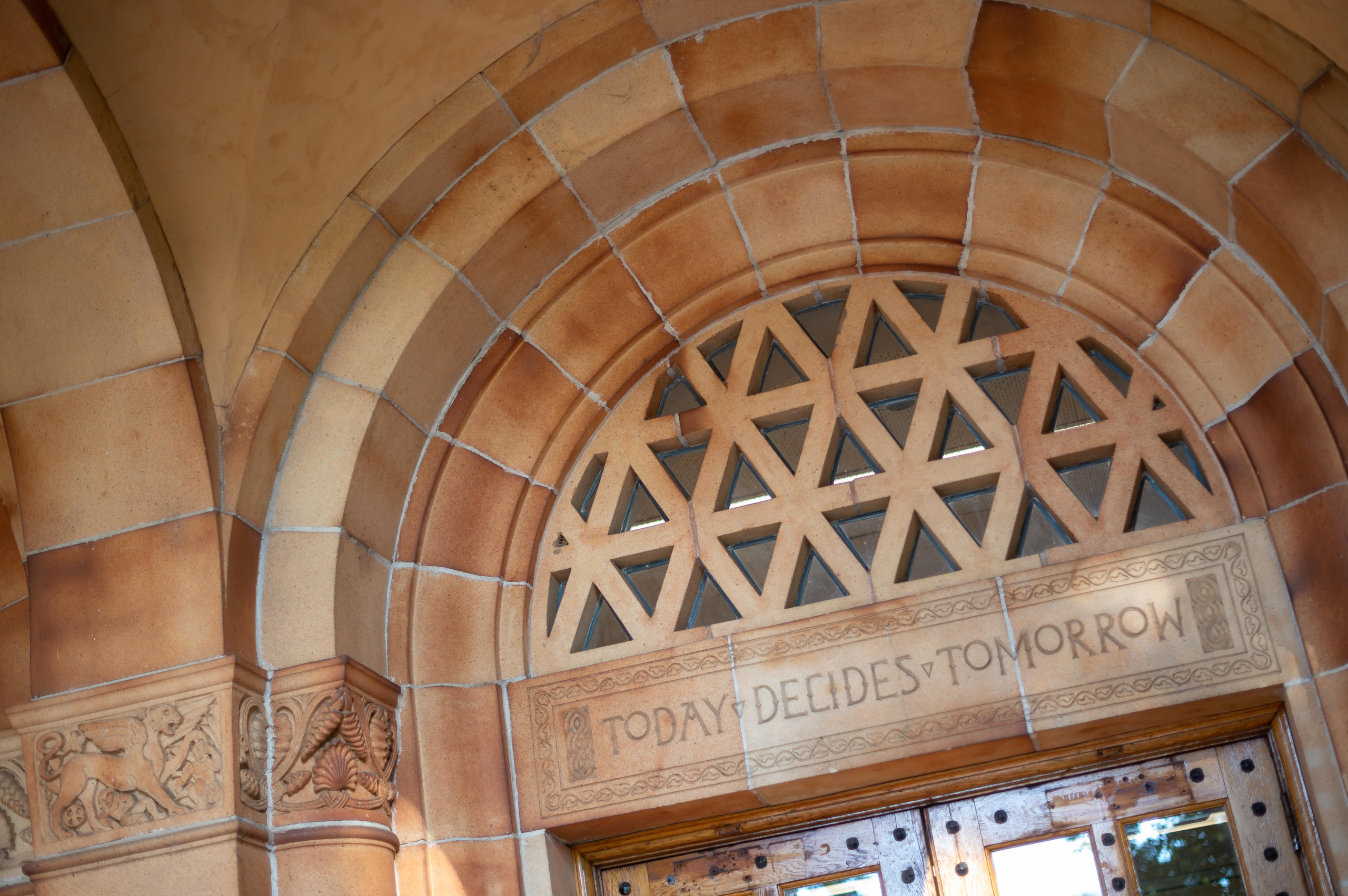 Today Decides Tomorrow is inscribed in stone above the entrance to Kendall hall