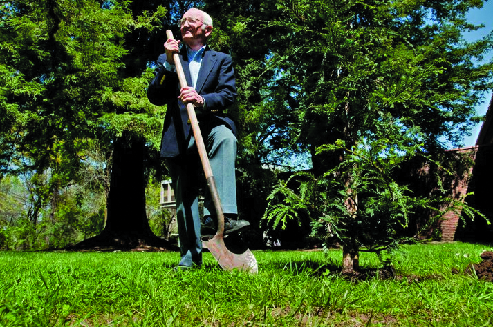Wes Dempsey plants a tree on campus in his honor.