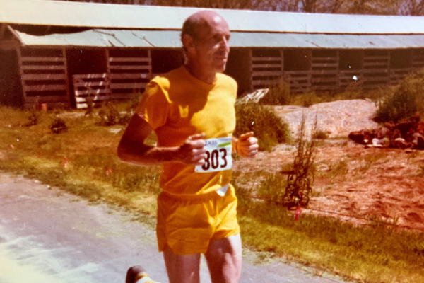 Dr. Robert "Bob" Thomas shown running competitively, which was one of his many passions.