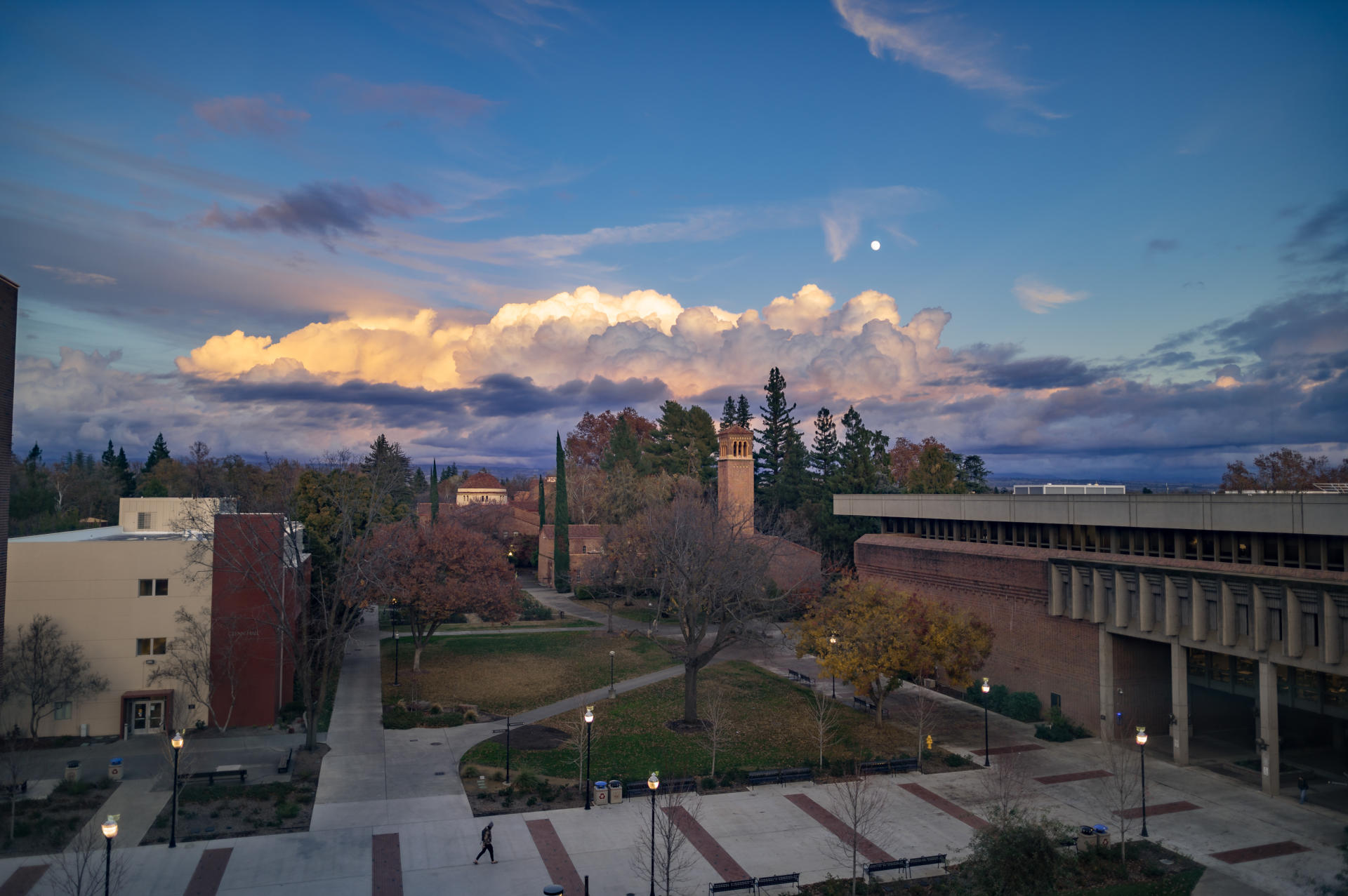 Storm clouds hover over a college campus