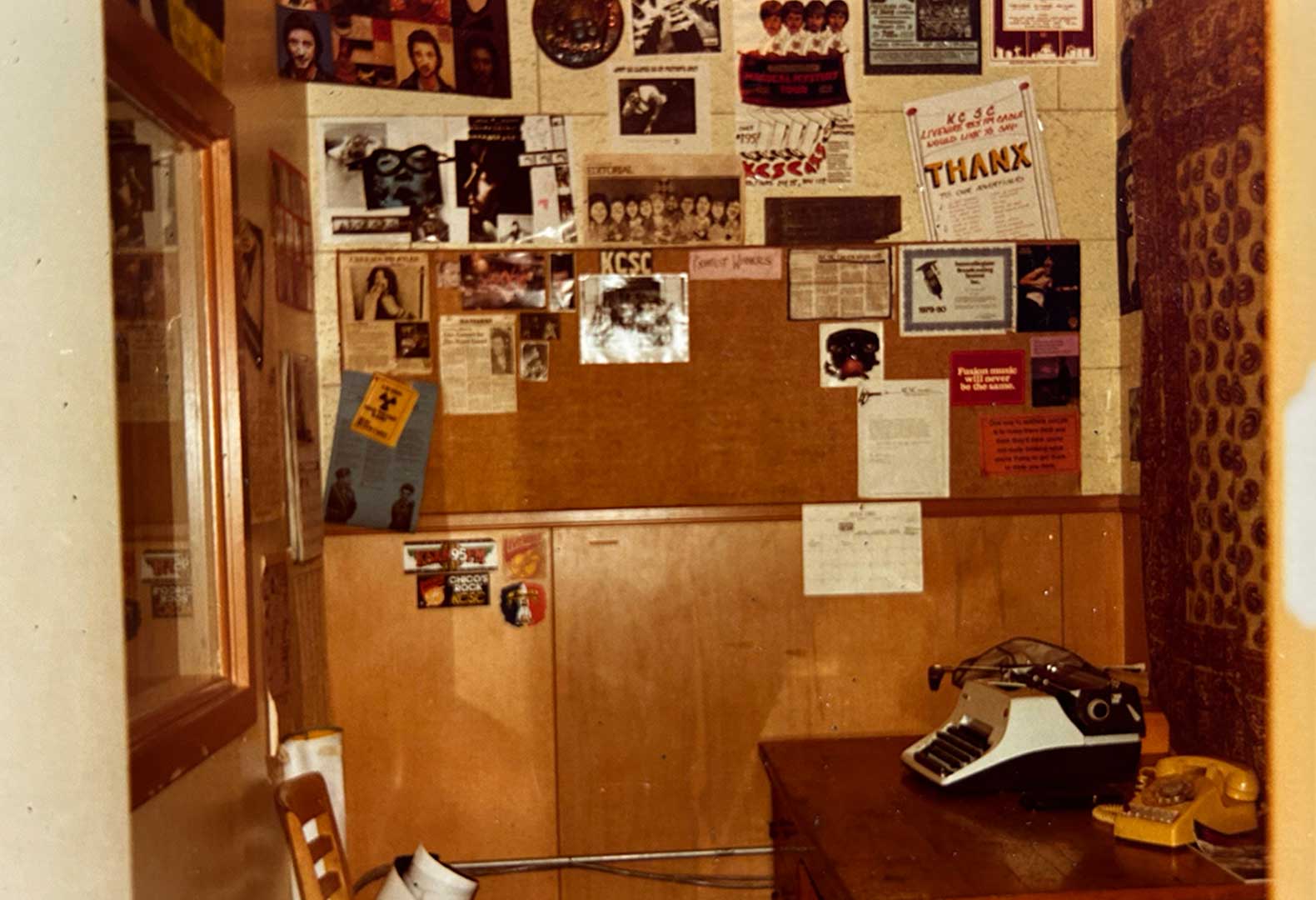 A photo from Ayers Hall in 1982, showing the old room where student employees at KCSC gathered to write and produce radio shows.