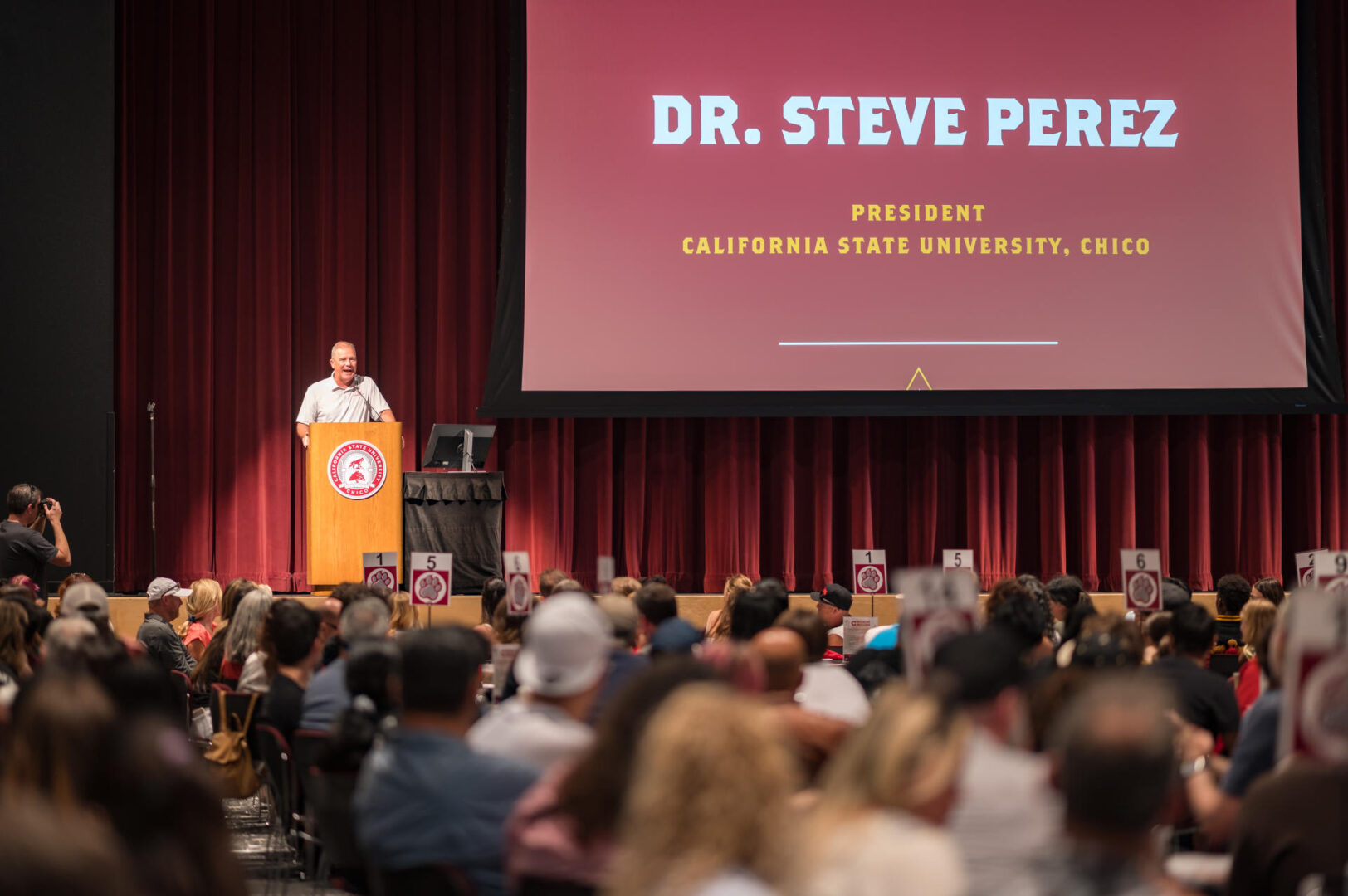 President Perez gives remarks to parents and incoming students while standing on the stage of the BMU just a few days into his presidency.