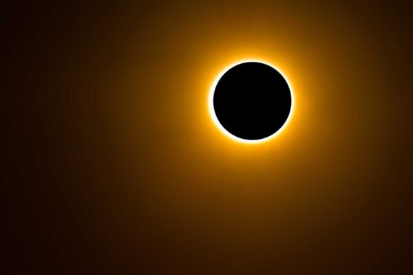 A photo of a total solar eclipse, where the sun is completely blocked out by the moon.
