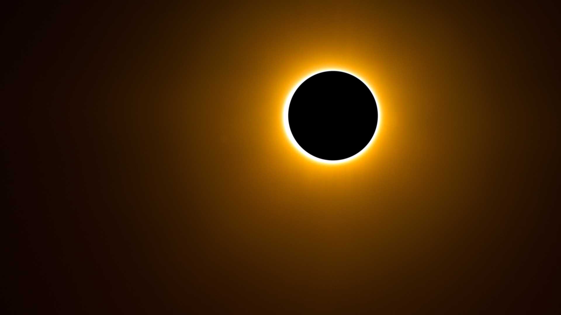 A photo of a total solar eclipse, where the sun is completely blocked out by the moon.