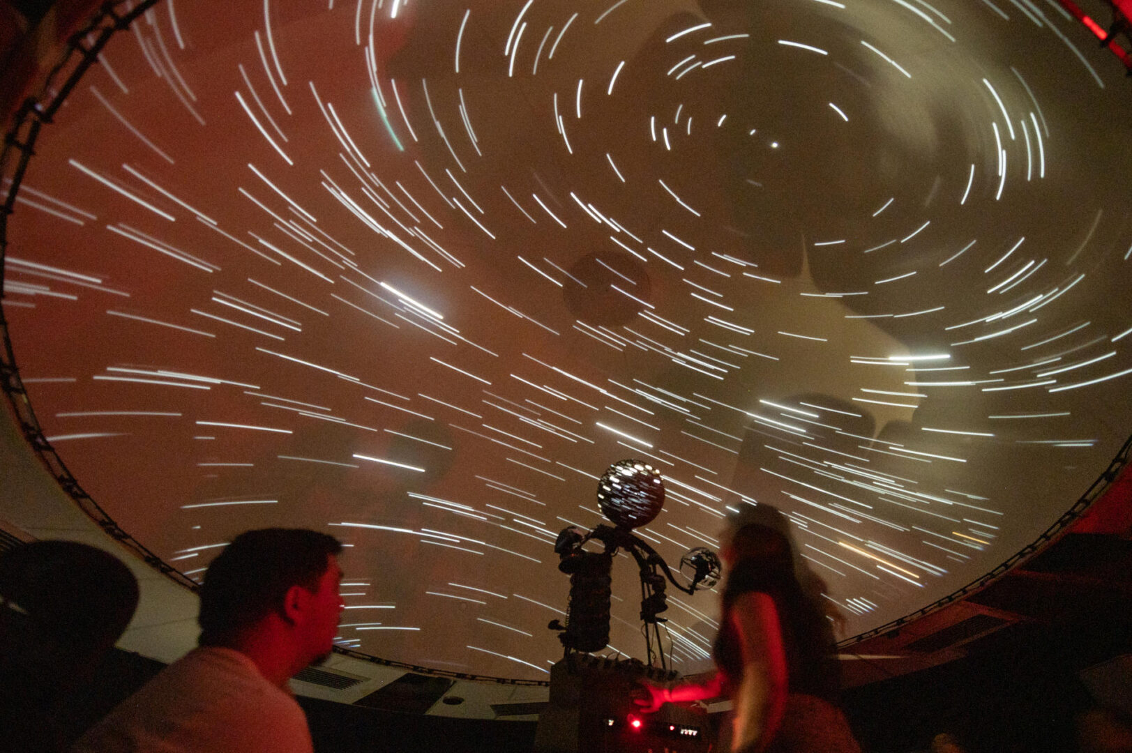 Students explore the universe in the Roth Planetarium at the Chico State campus.