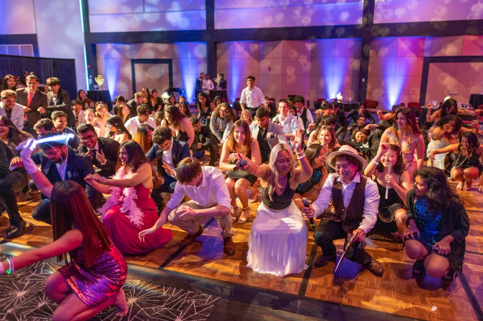 Dozens of students drop low the ground during the International Prom held at Chico State.