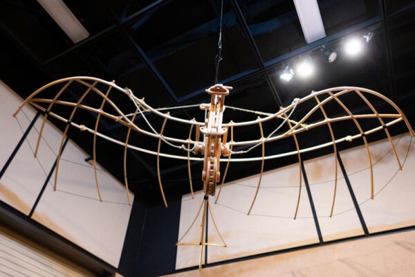 A model of Leonardo da Vinci's flying machine is suspended from the ceiling inside the Gateway Science Museum.
