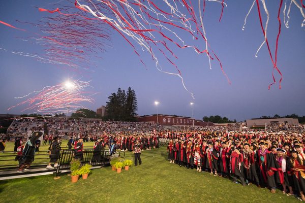 Streamers soar over graduating students of the College of Agriculture and College of Engineering, Computer Science, and Construction Management at the conclusion of their Commencement ceremony.