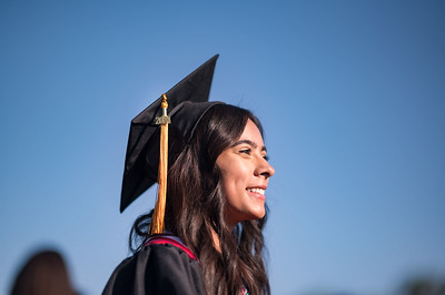 Photo of a student during the College of Humanities and Fine Arts and College of Natural Sciences Graduation Ceremony.