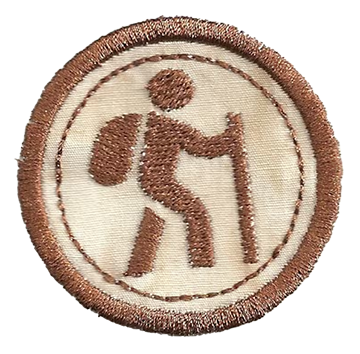 A merit badge depicting a hiker.