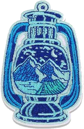 A patch depicting a lantern with a stylized mountain scape where the flame would be.