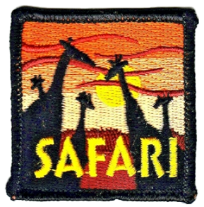 A patch that reads "Safari" and depicts giraffes in the foreground with a sunset in the background.