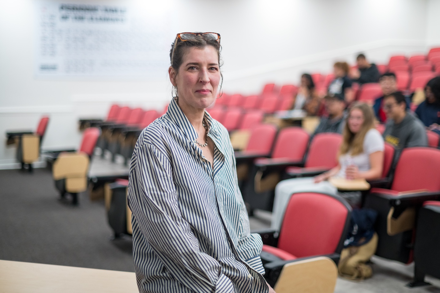 Kristen Gorman poses in front of her class.