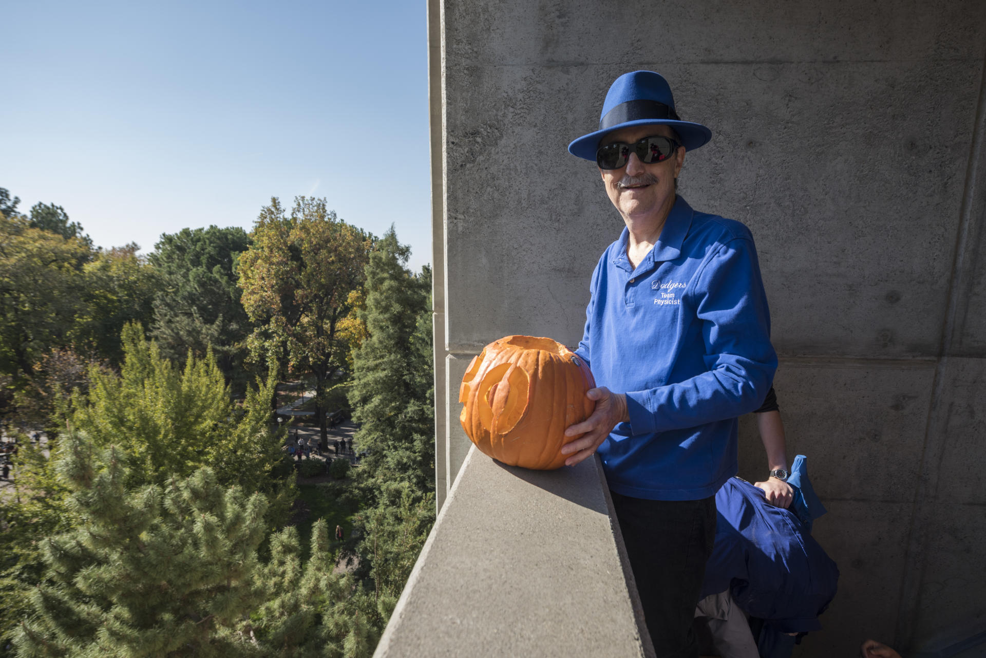 Dr. David Kagan poses with a pumpkin during the 2017 Pumpkin Drop.