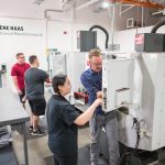 Students work with the computer numerical control machines in the Gene Haas Lab.